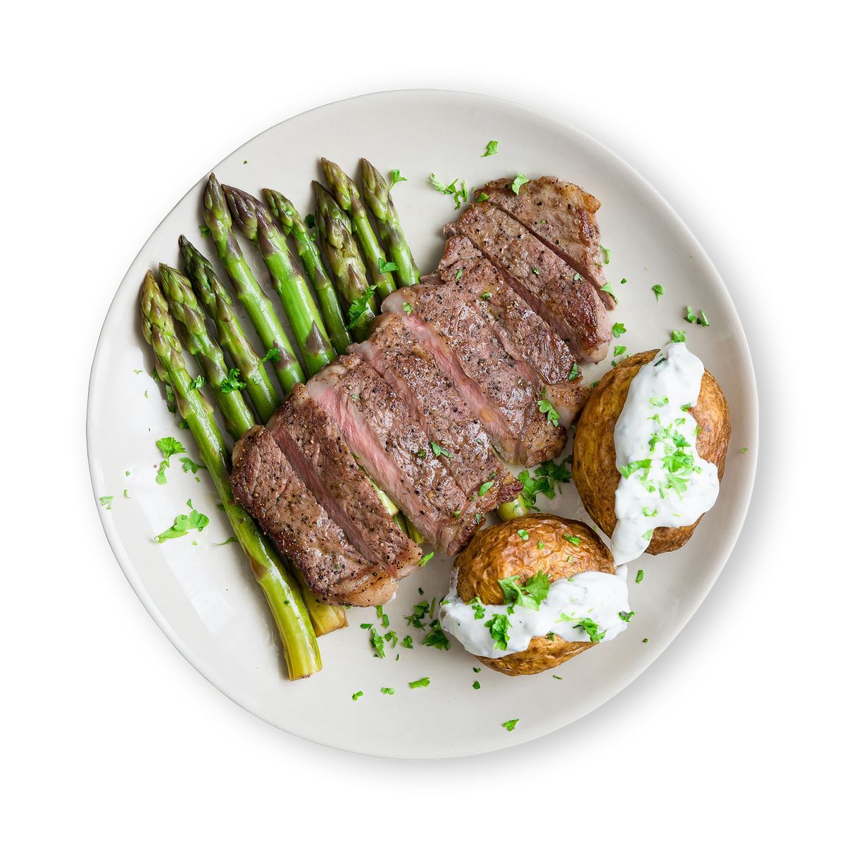 Steak mit grünem Spargel und Ofenkartoffel von feastr